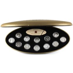 1999 Canada Millennium 12-coin 25-Cent Proof Sterling Silver Set (capsules are scratched).