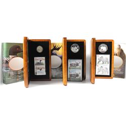 2004 Canada Coin and Stamp Sets - $1 The Elusive Loon, $5 The Majestic Moose & $8 The Great Grizzly.