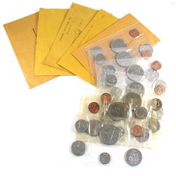 Estate Lot of 1972-1986 Year sets issued by the Canadian Coins of the Year Club (COTY) & RCM sets. L