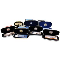 Group Lot of Canada Commemorative Coins: 1999 September Millennium 25-cent, 2000 Polar $2 Coins and