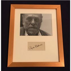 CHARLES BUKOWSKI SIGNED. (1920-1994). Autograph professionally framed.