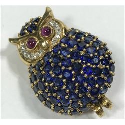 18 carat ruby, diamond and sapphire owl pin.