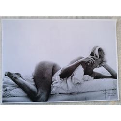 BERT STERN (1929-2013): MARILYN IN BED DRINKING RED WINE.