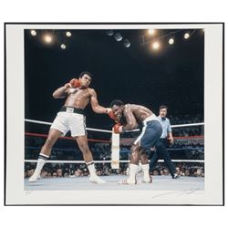 Muhammad Ali Throws a Punch at Joe Frazier, The Thrilla' in Manila.