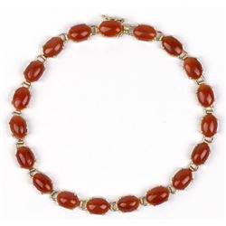 Coral and 14 carat yellow gold bracelet