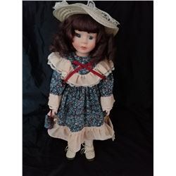 COLLECTION OF 4 PORCEAIN DOLLS.