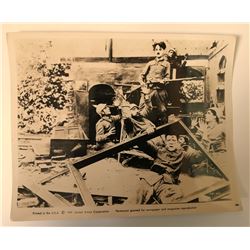 Charlie Chaplin in the film 'Shoulder Arms' vintage photo.