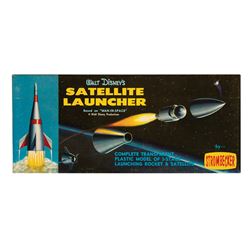 Pair of Man in Space Rocket Models.