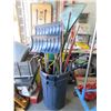 Image 1 : Trash Can Full of Garden Tools and Shovels