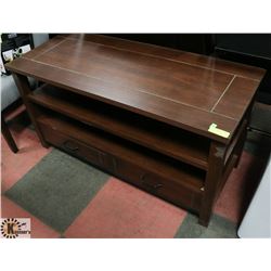 TV STAND WITH ROOM FOR STORAGE DOES HAVE SOME