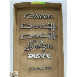 FLAT OF VINTAGE DODGE AND PLYMOUTH FENDER EMBLEMS