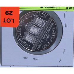 AUSTRIAN PHILHARMONIC TROY OUNCE SILVER ROUND.