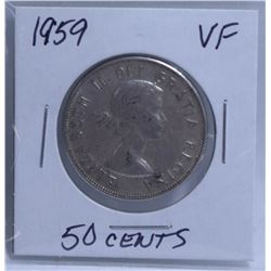 1959 50 CENT COIN.