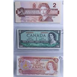 LOT OF 3 1986, 1974 $2 BILLS AND 1954 $1 BILL.