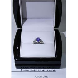 18) 14K WHITE GOLD TANZANITE AND DIAMOND RING