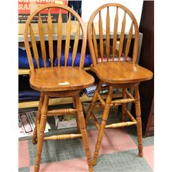 PAIR OF SOLID OAK, SWIVEL BAR STOOLS
