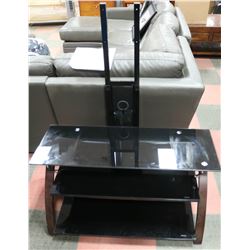 GLASS TOPPED TV STAND