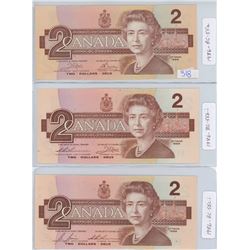 THREE 1986 CANADIAN TWO DOLLAR BILLS