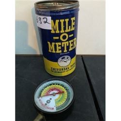 MILE-O-METER TIN AND VACCUM GUAGE