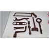 Image 1 : Saw and Assorted Wrenches