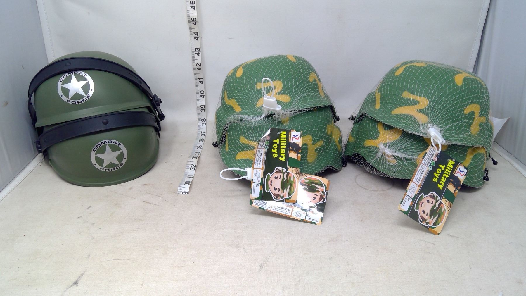 Six Child's Toy Army Helmets
