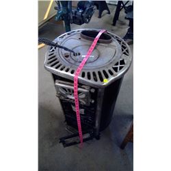 HEATER STOVE W/ BRICKS INTACT