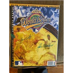 1996 World Series program Signed by Bernie Williams and John Wettland no COA