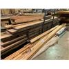 Image 2 : ASSORTED CROWN MOLDINGS & ASSORTED LOT OF APPROX 10' ROUGH TREATED PLANKS (CART NOT INCLUDED)