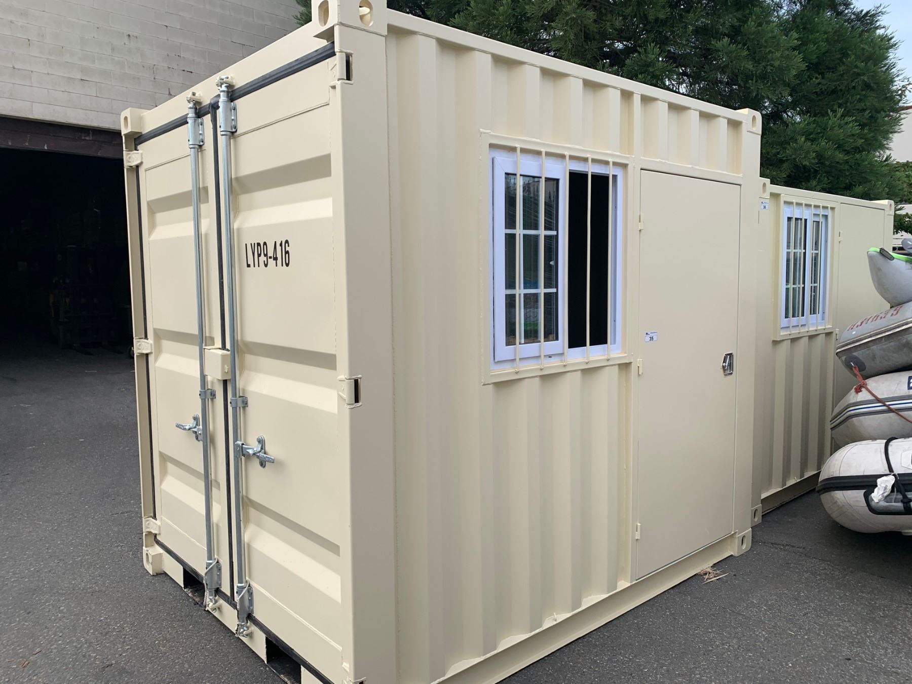 BRAND NEW 9FT STORAGE / OFFICE SHIPPING CONTAINER WITH BARRED WINDOW