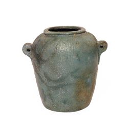 A Late Dynastic Nemset Vessel in Blue-Green Faience.