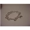 Image 2 : 100% STERLING SILVER FANCY ITALIAN CHARM BRACELET