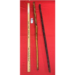 Two natural wood walking sticks