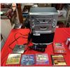 Image 1 : nice gently used kareoke machine with multiple microphones and cds
