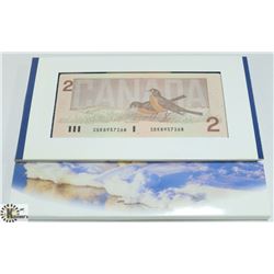 1986 UNCIRCULATED CANADA $2 NOTE AND COIN SET