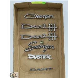 FLAT OF VINTAGE DODGE AND PLYMOUTH FENDER EMBLEMS