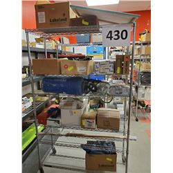 RACK OF UNCLAIMED ITEMS FROM THE TOOL SALE