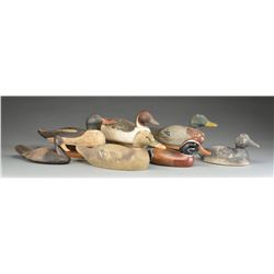 6 WOODEN DECOYS & 1 ORNAMENTAL DUCK.
