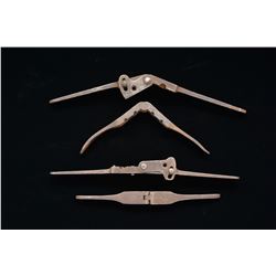 LOT OF 4 UNUSUAL IRON PISTOL MOLDS.