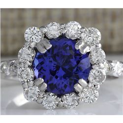 4.12 CTW Natural Blue Tanzanite And Diamond Ring In 18K White Gold