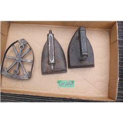Two Sad Irons and a Trivet