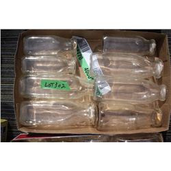 Collection of Cream Bottles (8)