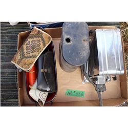 Flat with a Toaster, Battery Box and a Basket of Eye Glasses