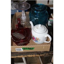 Flat with Plastic Ware, a Tea Pot and a Blue Glass Water Pitcher