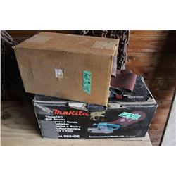 Makita Belt Sander and a Box with Extra Belts