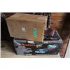 Image 1 : Makita Belt Sander and a Box with Extra Belts