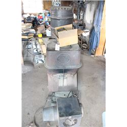 Booker Heater with a Galvanized Pail of Coal