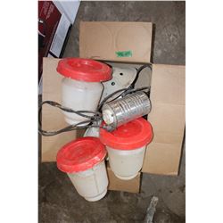 Box with (3) Chicken Feeders and a Brooder Lamp