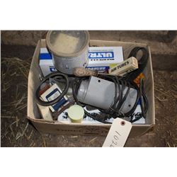 Box of Milk Machine Parts and a Heater