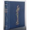 Image 1 : Book and Bronze Sculpture.