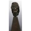 Image 2 : Book and Bronze Sculpture.
